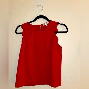 Red sleeveless top